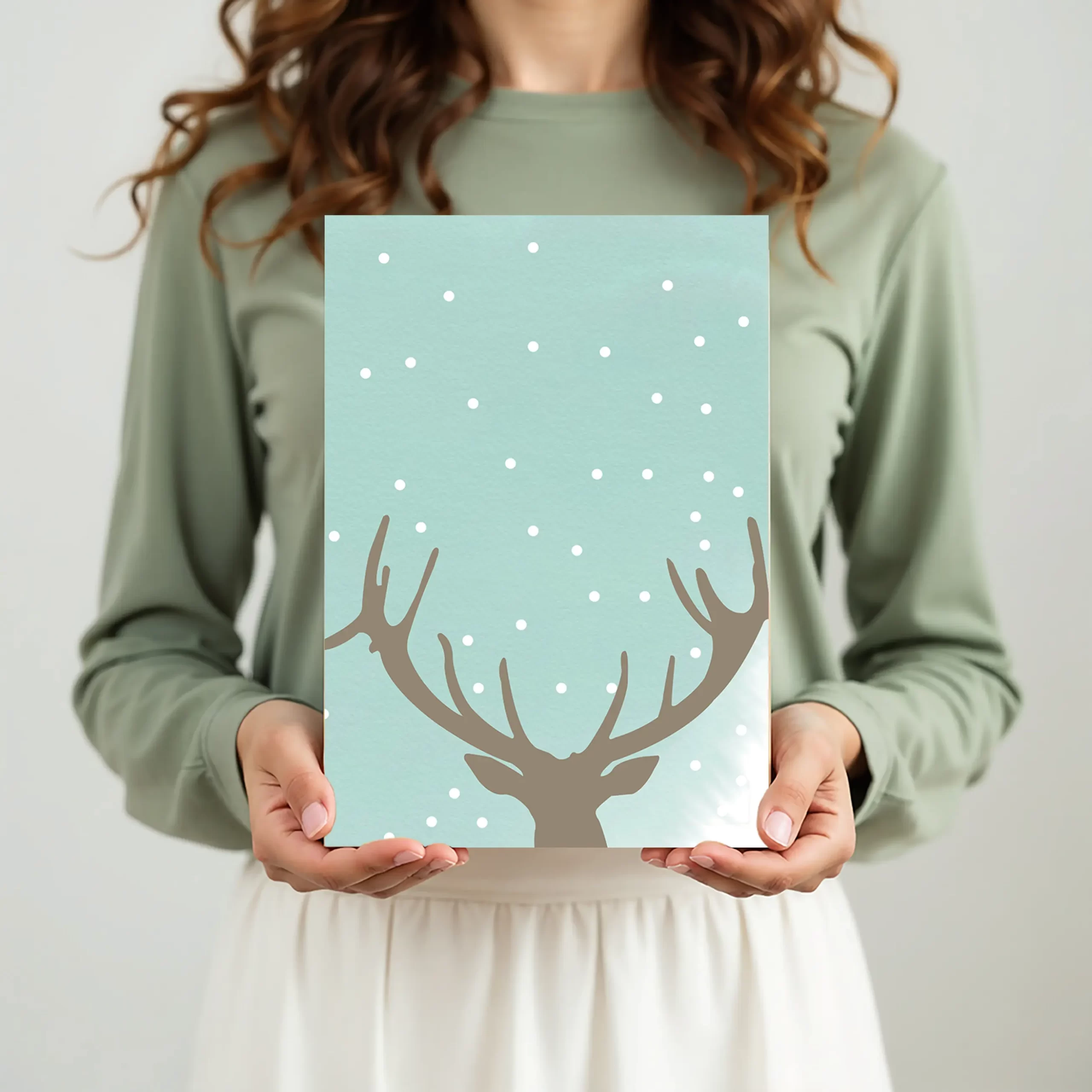kerstkaart met blauw rendier in hand, eco BIO TOP-papier