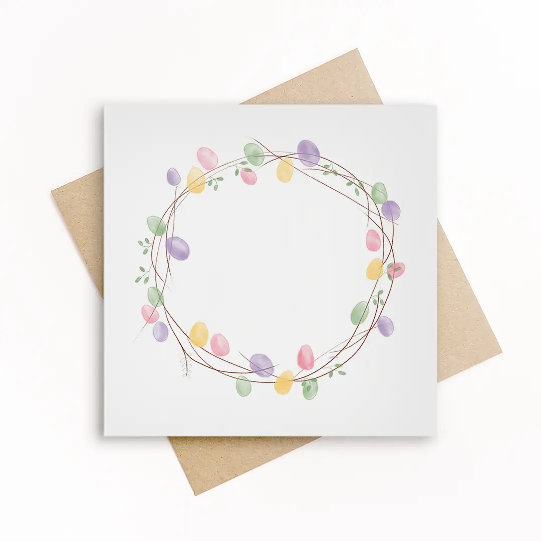Vierkante wenskaart met pastel paaseieren in een krans van takjes, lente kaart van Grafiquelien