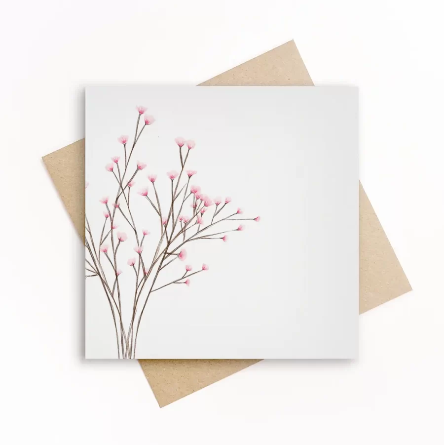 Wenskaart met handgetekende takken met roze bloesem op witte achtergrond